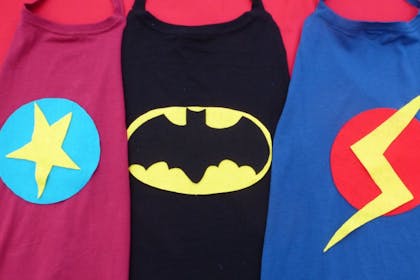 Capes decorated with superhero logos