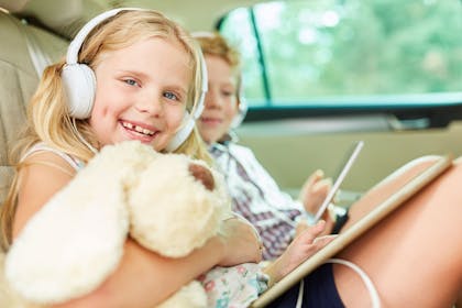 Kids listening to music in car