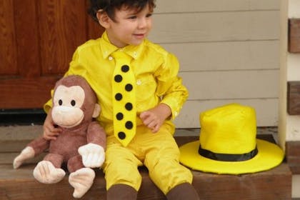 little boy dressed as curious george