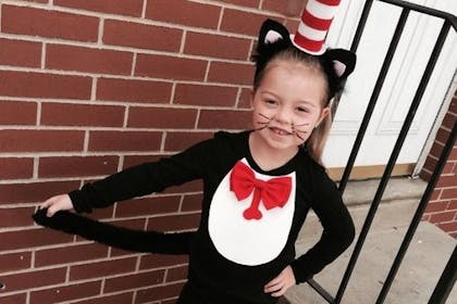 little girl dressed as cat in the hat character
