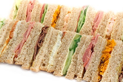 A platter of sandwiches with different fillings