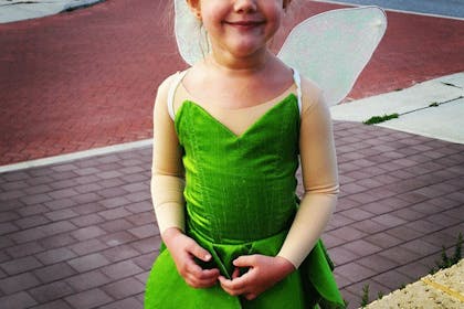 girl dressed as tinkerbell